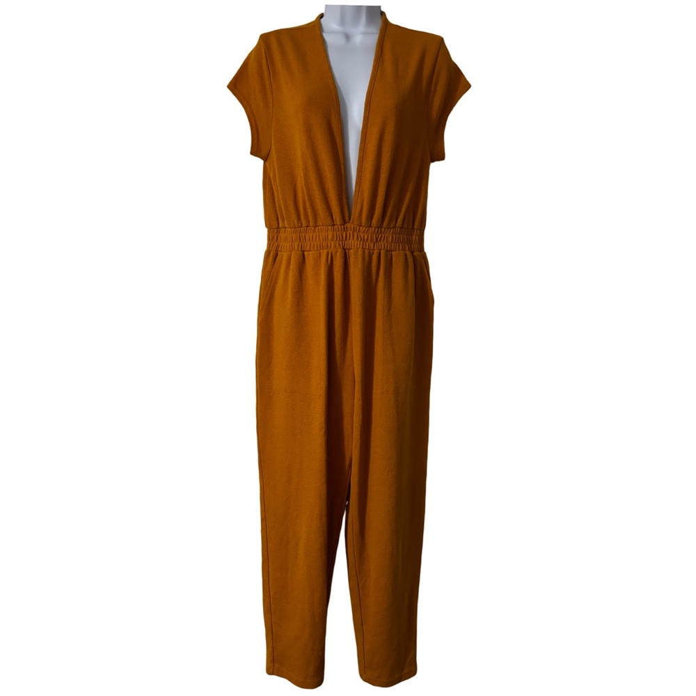 Free People Beach deep cut Women's Mustard Jumpsuit size small